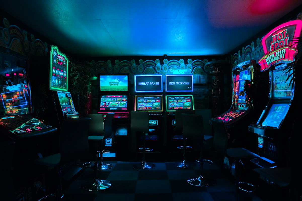 Row of professional esports gaming stations in a tournament training facility